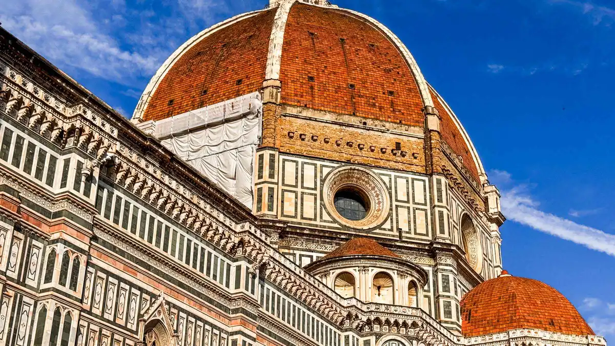 Guide with a small group at the Baptistery before the Brunelleschi Dome climb in Florence, Italy