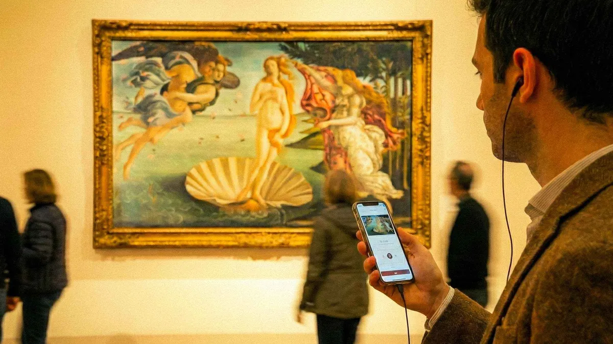 Visitors in front of Botticelli's Birth of Venus at the Uffizi Gallery, Florence, Italy