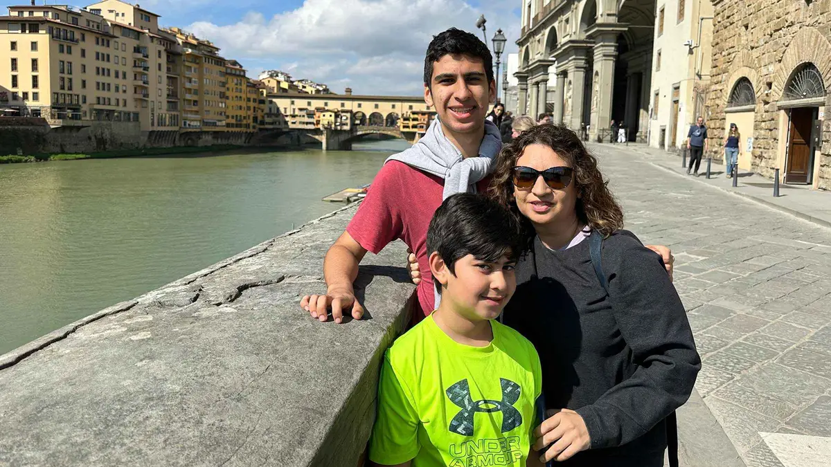 Family with children at Ponte Vecchio on a Florence walking tour for kids and families with gelato
