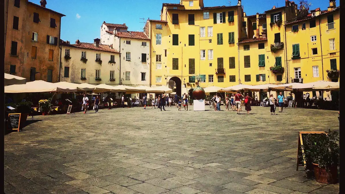 Piazza dell Anfiteatro on a 2-hour Lucca city centre walking tour, a day trip from Florence by train