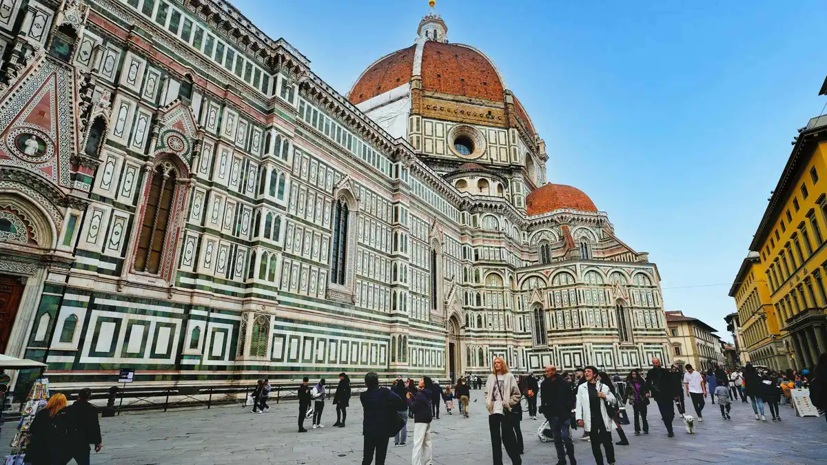 Brunelleschi's dome and the marble facade of Florence Cathedral, the first stop on a Florence, Italy must-see walk