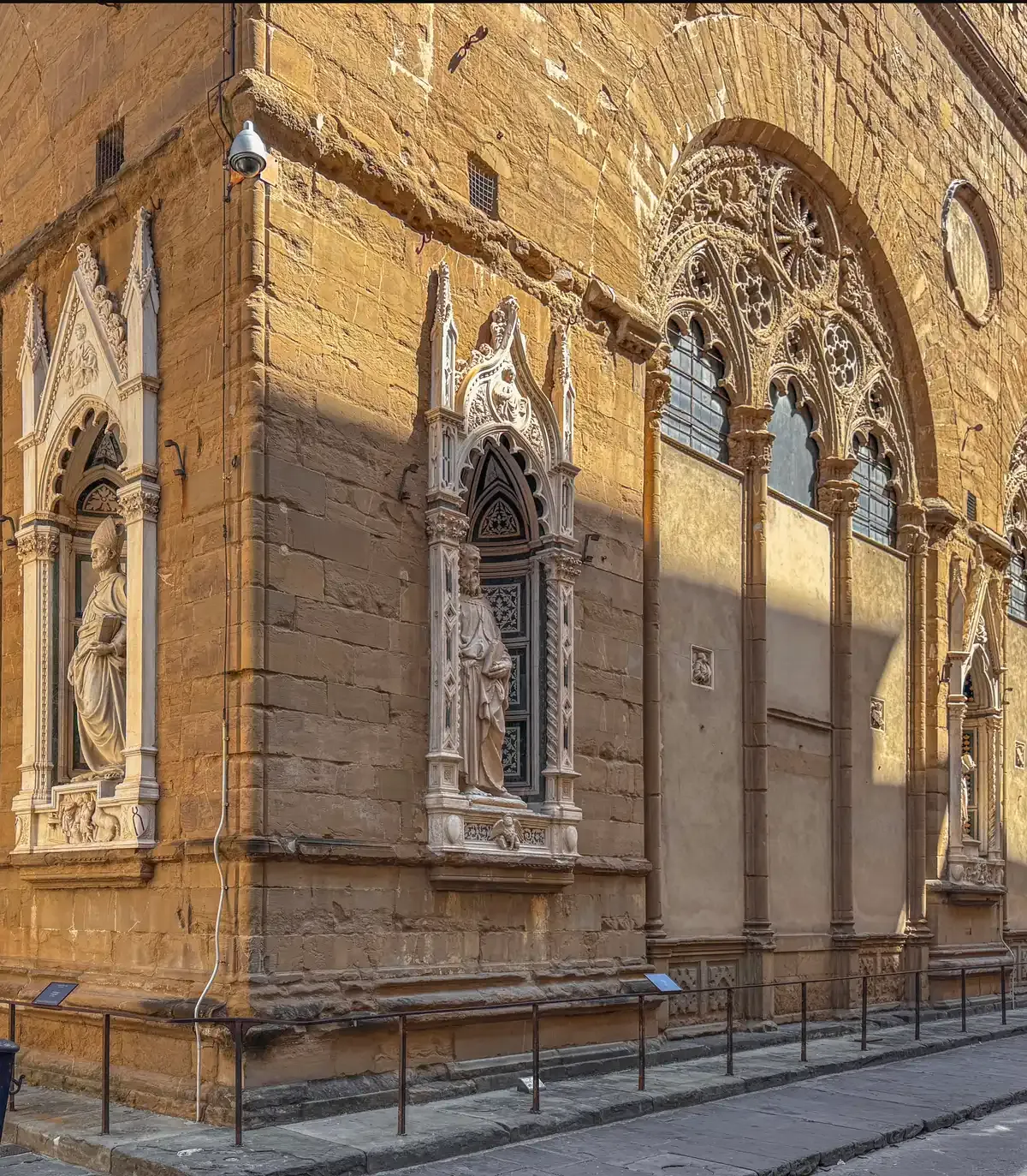 The Gothic niches with guild statues on the outside of Orsanmichele, halfway along Via dei Calzaiuoli in Florence's historic centre
