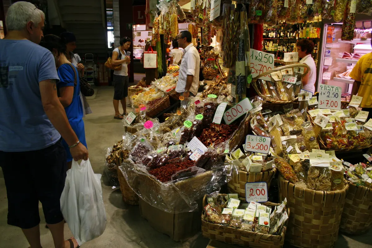 Stalls of dried tomatoes, mushrooms and pasta on the ground floor of the Mercato Centrale