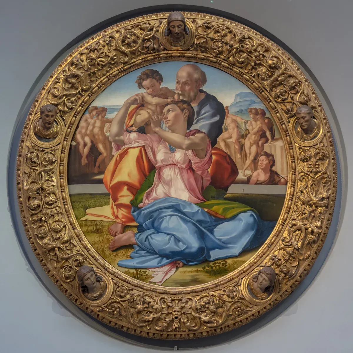 Michelangelo's Doni Tondo in its carved gilt frame at the Uffizi Gallery, Florence