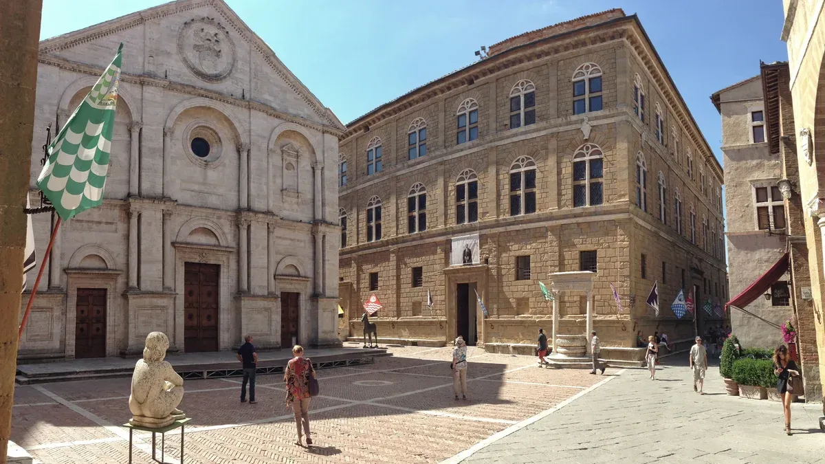 Piazza Pio II in Pienza with the cathedral and Palazzo Piccolomini, a stop on Val d'Orcia day trips from Florence